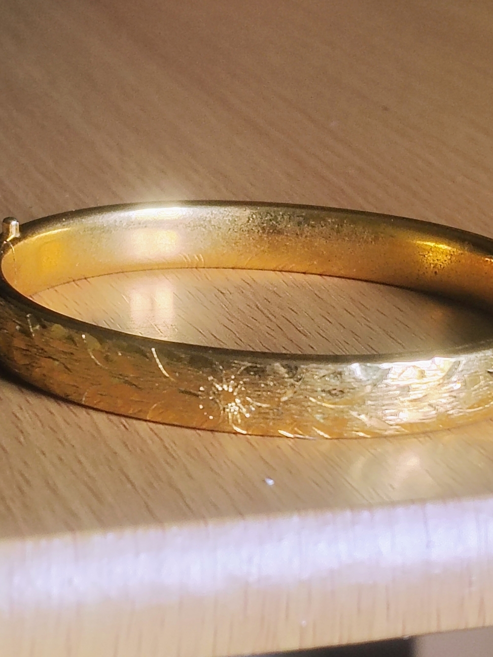 Napier Gold Tone Floral Engraved Hinged Bangle Bracelet